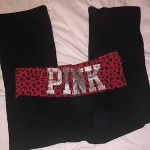 Black Victoria’s Secret “PINK” leggings.